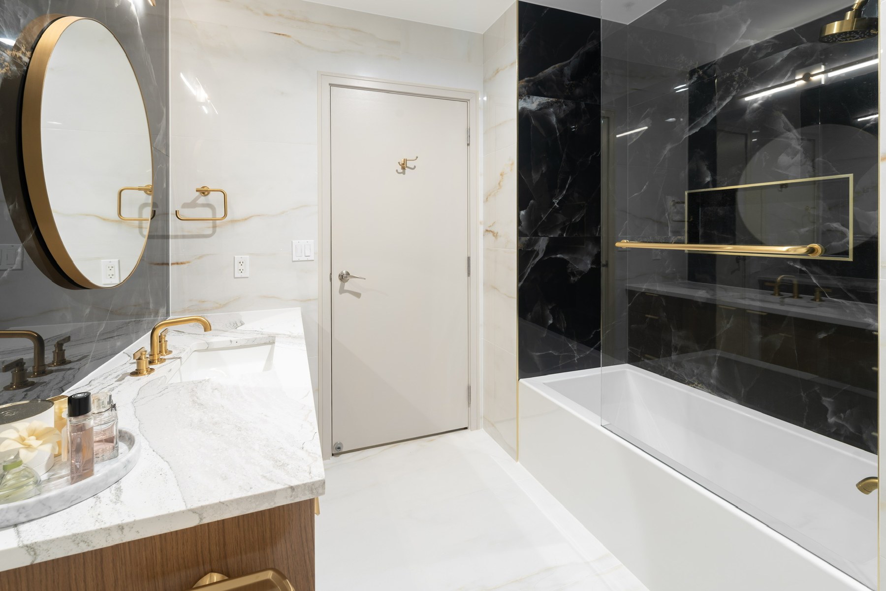 Tub and marble walls